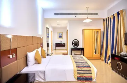 صورة لـ غرفة- غرفة النوم شقة - 1 حمام للايجار في البرشاء 1 - البرشاء - دبي ، صورة رقم 1