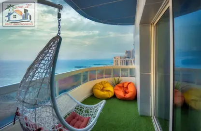 Apartment - 1 Bedroom - 2 Bathrooms for rent in Corniche Tower - Ajman Corniche Road - Ajman