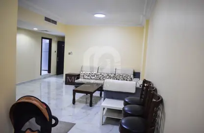 Living Room image for: Apartment - 2 Bedrooms - 2 Bathrooms for sale in Al Majaz Tower - Al Majaz - Sharjah, Image 1