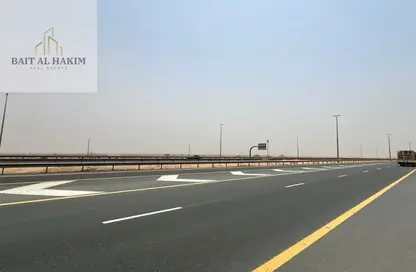 أرض - استوديو للبيع في روضة القرط - ضاحية الروضات - الشارقة