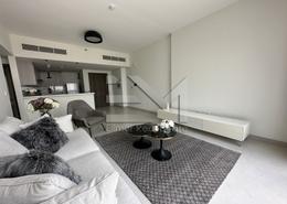 Living Room image for: Apartment - 1 bedroom - 1 bathroom for rent in 1 Residences - Wasl1 - Al Kifaf - Dubai, Image 1
