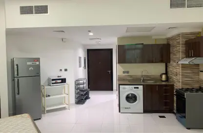 صورة لـ مطبخ شقة - 1 حمام للايجار في ارابيان جات - واحة السيليكون - دبي ، صورة رقم 1