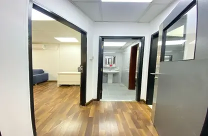 Business Centre - Studio - 2 Bathrooms for rent in Al Rais Building - Al Karama - Dubai