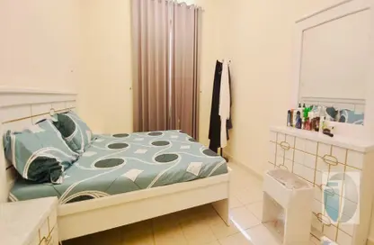 شقة - غرفة نوم - 2 حمامات للايجار في واي 5 - طراز إنجليزي - المدينة الدولية - دبي