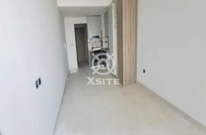 Apartment - Studio - 1 Bathroom for rent in Amal Tower - Dubai Sports City - Dubai