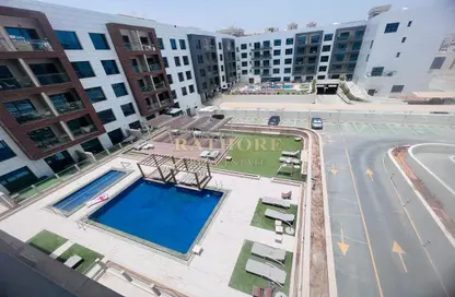 Pool image for: Apartment - 1 Bedroom - 2 Bathrooms for rent in Oxford Building - Jumeirah Village Circle - Dubai, Image 1