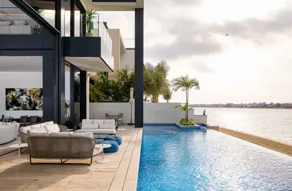 Pool image for: Villa - 5 Bedrooms - 7 Bathrooms for rent in Garden Homes Frond N - Garden Homes - Palm Jumeirah - Dubai, Image 1