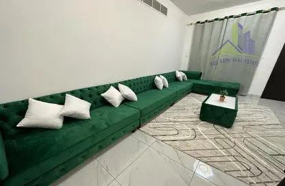 Living Room image for: Apartment - 2 Bedrooms - 2 Bathrooms for rent in Al Naemiya Tower 1 - Al Naemiya Towers - Al Nuaimiya - Ajman, Image 1