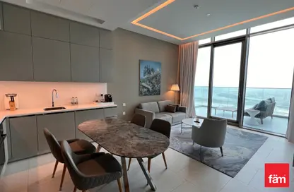 Living / Dining Room image for: Apartment - 1 Bedroom - 2 Bathrooms for sale in SLS Dubai Hotel  and  Residences - Business Bay - Dubai, Image 1