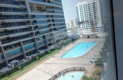 صورة لـ حوض سباحة شقة - غرفة نوم - 1 حمام للايجار في سكاي كورتس تاور A - أبراج سكاي كورتس - دبي لاند - دبي ، صورة رقم 1