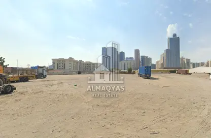 أرض - استوديو للبيع في مدينة الإمارات الصناعية - الشارقة