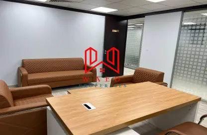 Living Room image for: Office Space - Studio - 2 Bathrooms for rent in Al Garhoud - Dubai, Image 1