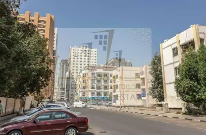 عمارة بالكامل - استوديو - 8 حمامات للبيع في الند - القاسمية - الشارقة
