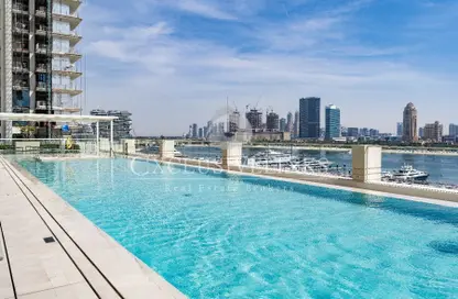 Pool image for: Apartment - 1 Bedroom - 2 Bathrooms for sale in Marina Vista - EMAAR Beachfront - Dubai Harbour - Dubai, Image 1