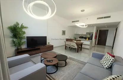 Living / Dining Room image for: Apartment - 1 Bedroom - 2 Bathrooms for sale in O2 Tower - Jumeirah Village Circle - Dubai, Image 1