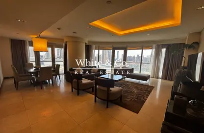 صورة لـ غرفة المعيشة / غرفة الطعام شقة - 2 غرف نوم - 2 حمامات للايجار في فندق العنوان دبي مول - دبي وسط المدينة - دبي ، صورة رقم 1