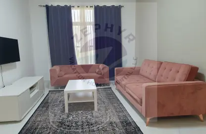 Living Room image for: Apartment - 1 Bedroom - 2 Bathrooms for rent in District 13H - Jumeirah Village Circle - Dubai, Image 1