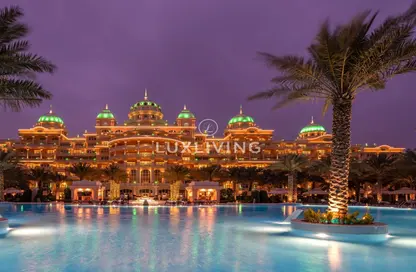 Pool image for: Apartment - 2 Bedrooms - 3 Bathrooms for sale in Raffles The Palm - The Crescent - Palm Jumeirah - Dubai, Image 1