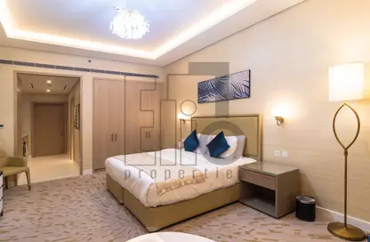 صورة لـ غرفة- غرفة النوم شقة - 1 حمام للايجار في برج النخيل - نخلة جميرا - دبي ، صورة رقم 1