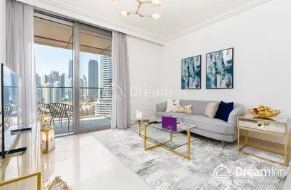 Living Room image for: Apartment - 1 Bedroom - 1 Bathroom for rent in Boulevard Point - Downtown Dubai - Dubai, Image 1