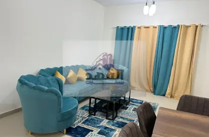 Living Room image for: Apartment - 1 Bedroom - 2 Bathrooms for rent in Al Naemiya Tower 2 - Al Naemiya Towers - Al Nuaimiya - Ajman, Image 1