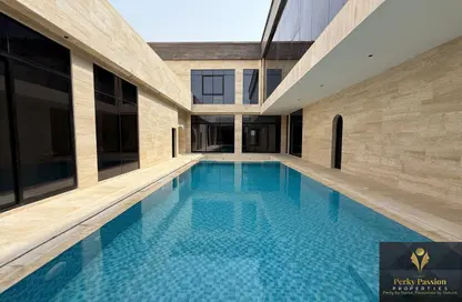 Villa - 4 Bedrooms - 7 Bathrooms for rent in Wadi Alshabak - Dubai