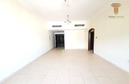 Empty Room image for: Apartment - 1 Bedroom - 2 Bathrooms for rent in Art 8 - Barsha Heights (Tecom) - Dubai, Image 1