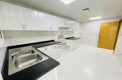 Kitchen image for: Apartment - 3 Bedrooms - 4 Bathrooms for rent in Lafzaeyya Tower - Khalifa Street - Abu Dhabi, Image 1