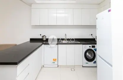 Kitchen image for: Apartment - 2 Bedrooms - 3 Bathrooms for rent in Tower 108 - Jumeirah Village Circle - Dubai, Image 1