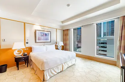 Room / Bedroom image for: Hotel  and  Hotel Apartment - 2 Bedrooms - 3 Bathrooms for rent in Ritz Carlton - DIFC - Dubai, Image 1