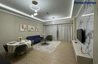 Living / Dining Room image for: Apartment - 2 Bedrooms - 2 Bathrooms for rent in Croesus - Majan - Dubai, Image 1