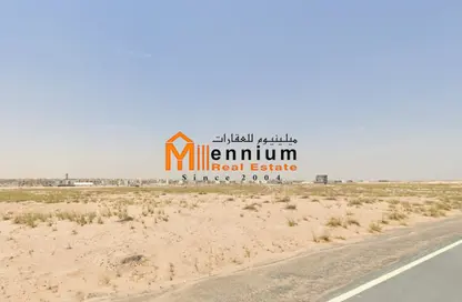 أرض - استوديو للبيع في روضة القرط - ضاحية الروضات - الشارقة