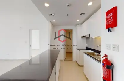 Kitchen image for: Apartment - 2 Bedrooms - 3 Bathrooms for rent in The Pulse Boulevard Apartments (C2) - The Pulse - Dubai South (Dubai World Central) - Dubai, Image 1
