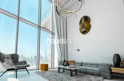 Living Room image for: Apartment - 1 Bedroom - 2 Bathrooms for sale in SLS Dubai Hotel  and  Residences - Business Bay - Dubai, Image 1