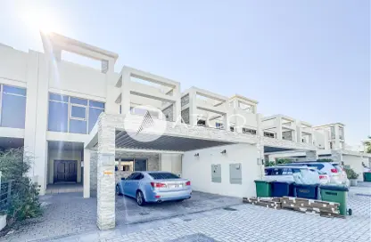 Outdoor Building image for: Townhouse - 3 Bedrooms - 4 Bathrooms for rent in The Polo Townhouses - Meydan Gated Community - Meydan - Dubai, Image 1