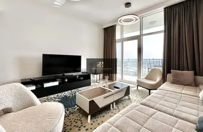 Living Room image for: Apartment - 1 Bedroom - 2 Bathrooms for sale in Tower 108 - Jumeirah Village Circle - Dubai, Image 1