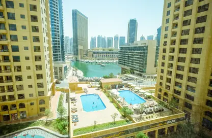 صورة لـ حوض سباحة شقة - غرفة نوم - 1 حمام للايجار في بحر 4 - بحر - مساكن شاطئ الجميرا - دبي ، صورة رقم 1