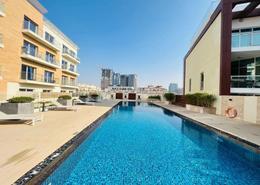 Pool image for: Apartment - 1 bedroom - 2 bathrooms for sale in Oxford Residence - Jumeirah Village Circle - Dubai, Image 1