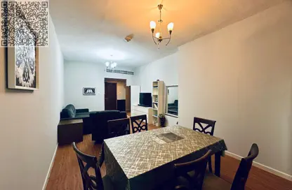 شقة - غرفة نوم - 2 حمامات للايجار في أورينت تاور 1 - أورينت تاور - البستان - عجمان