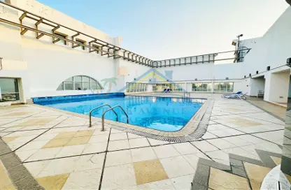 صورة لـ حوض سباحة شقة - غرفة نوم - 2 حمامات للايجار في الخالدية - أبوظبي ، صورة رقم 1