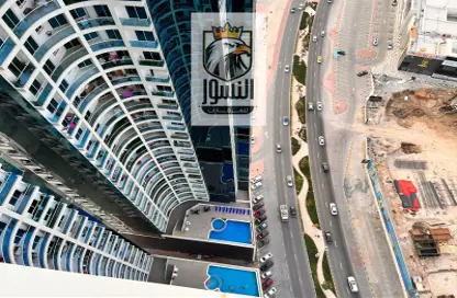 Outdoor Building image for: Apartment - 1 Bedroom - 2 Bathrooms for rent in Oasis Tower - Al Rashidiya 1 - Al Rashidiya - Ajman, Image 1