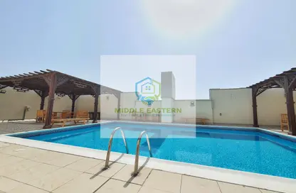 Pool image for: Apartment - 2 Bedrooms - 3 Bathrooms for rent in Al Mamoura - Muroor Area - Abu Dhabi, Image 1