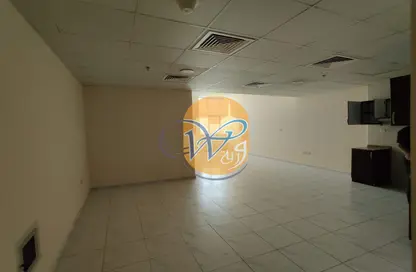 Empty Room image for: Apartment - 1 Bathroom for sale in RAK Tower - Al Seer - Ras Al Khaimah, Image 1