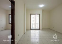 Empty Room image for: Apartment - 1 bedroom - 2 bathrooms for rent in France Cluster - International City - Dubai, Image 1