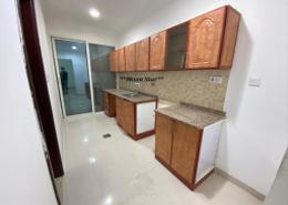 Kitchen image for: Apartment - 1 bedroom - 2 bathrooms for rent in Khalifa City A Villas - Khalifa City A - Khalifa City - Abu Dhabi, Image 1