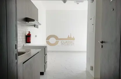 Kitchen image for: Apartment - 1 Bathroom for rent in Time 1 - Dubai Land - Dubai, Image 1