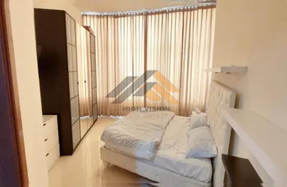 Room / Bedroom image for: Apartment - 1 Bedroom - 2 Bathrooms for rent in Orient Towers - Al Bustan - Ajman, Image 1