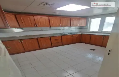 Kitchen image for: Apartment - 1 Bedroom - 1 Bathroom for rent in Al Zahraa - Abu Dhabi, Image 1
