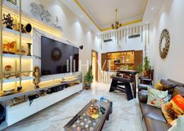 Living Room image for: Apartment - 2 bedrooms - 4 bathrooms for sale in Qamar 10 - Madinat Badr - Al Muhaisnah - Dubai, Image 1