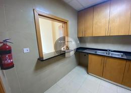 صورةمطبخ لـ: شقة - 1 غرفة نوم - 2 حمامات للبيع في برج جلفار السكني - براج جلفار - النخيل - رأس الخيمة, صورة 1
